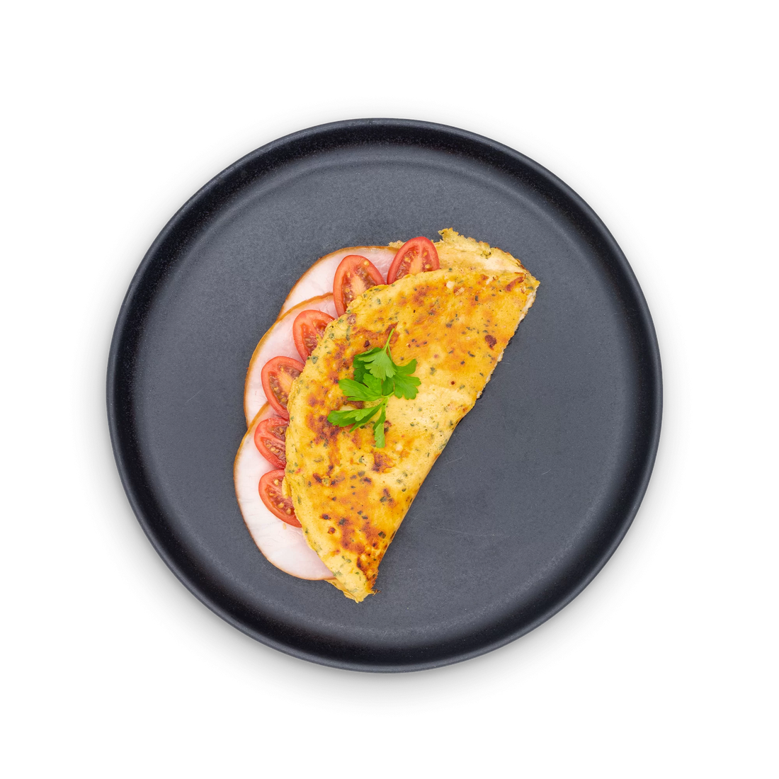 Omelette with ham and tomatoes