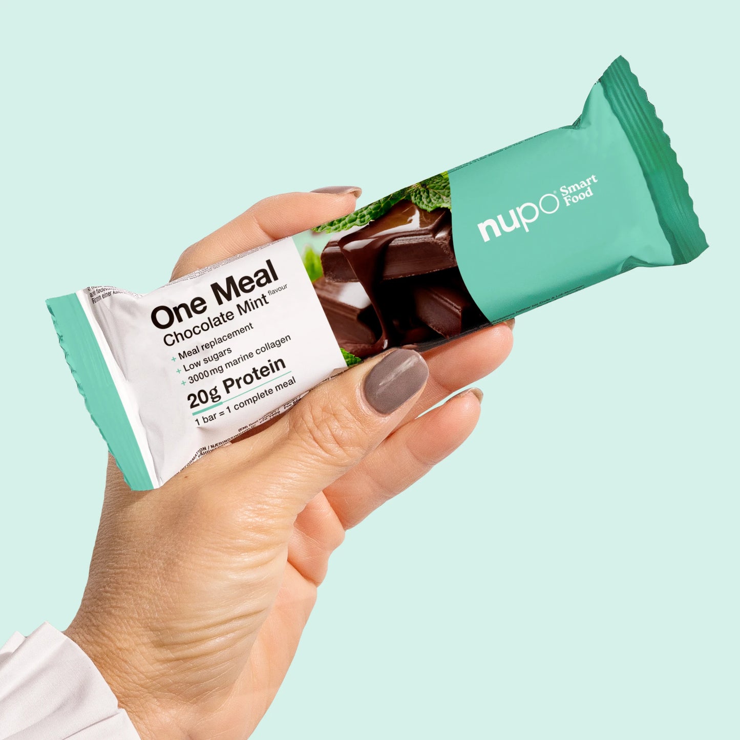 Nupo One Meal Bar Chocolate Mint bar in hand